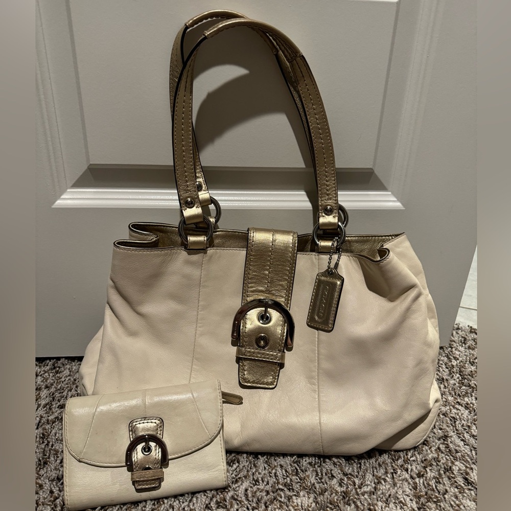 Off white coach purse & matching wallet.